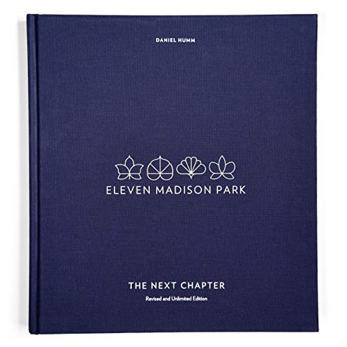 Dark blue cookbook, “Eleven Madison Park: The Next Chapter” by Daniel Humm.