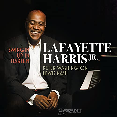 Lafayette Harris Jr. album cover, smiling man in a suit, piano keys.