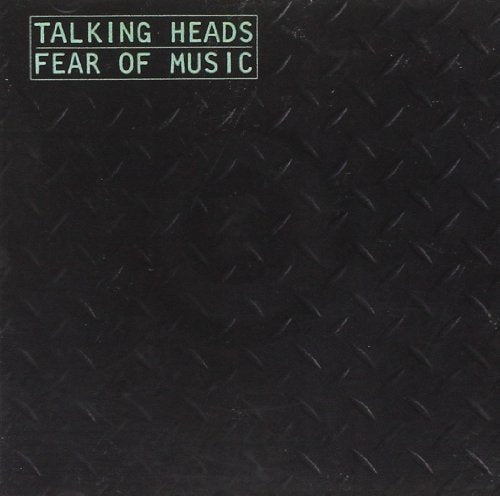 The alt text for the image is: "Black album cover with 'Talking Heads Fear of Music' in green text."