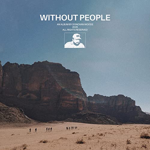 Album cover for Donovan Woods’ “Without People” featuring desert landscape.