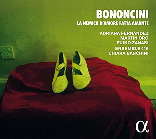 CD cover: green background, red fabric, and a pair of pale shoes.