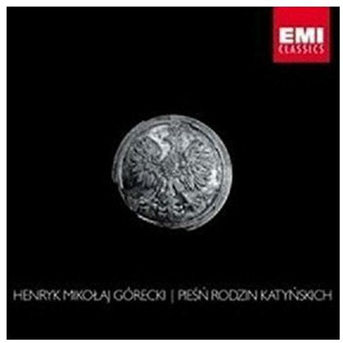 CD cover: black background with a silver, ornate circular design.