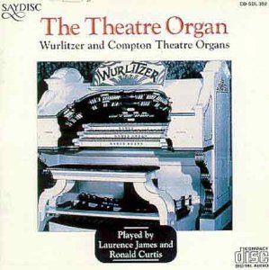 The image shows a CD cover with a Wurlitzer theatre organ and text.