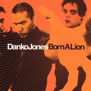 Album cover for Danko Jones’ “Born a Lion” featuring band members’ portraits.