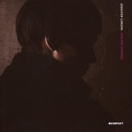"CD cover with dark, shadowy figure and text 'Jennifer Cardini - Feeling Strange' on right."
