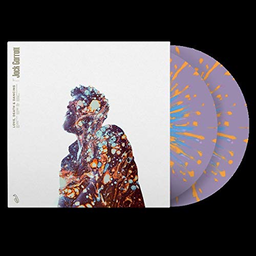 Vinyl LP with colorful splatter effect and abstract portrait cover art.