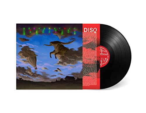 Vinyl record with cover art depicting a dinosaur among clouds.
