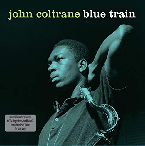 John Coltrane album cover, portrait of musician with saxophone.