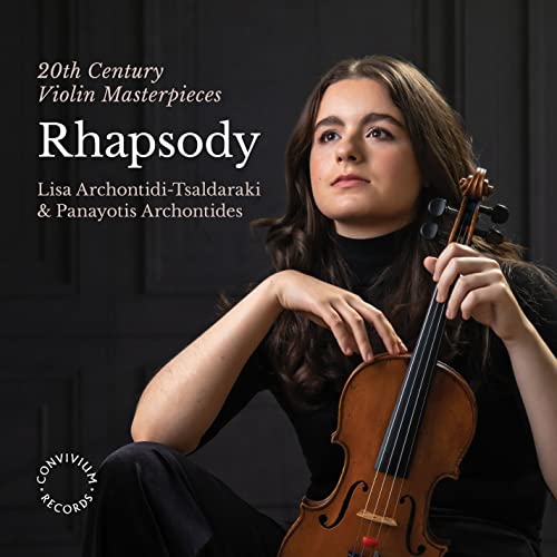 Woman holding a violin, album cover for "Rhapsody" CD.