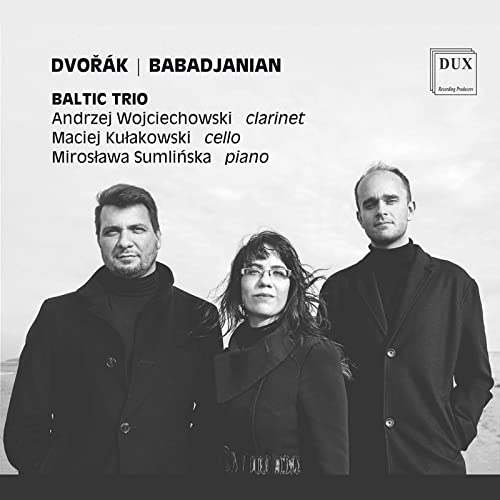 CD cover featuring three musicians in dark coats, black and white.