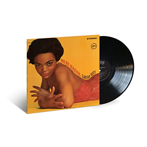 Eartha Kitt album cover and vinyl record, yellow background, portrait.