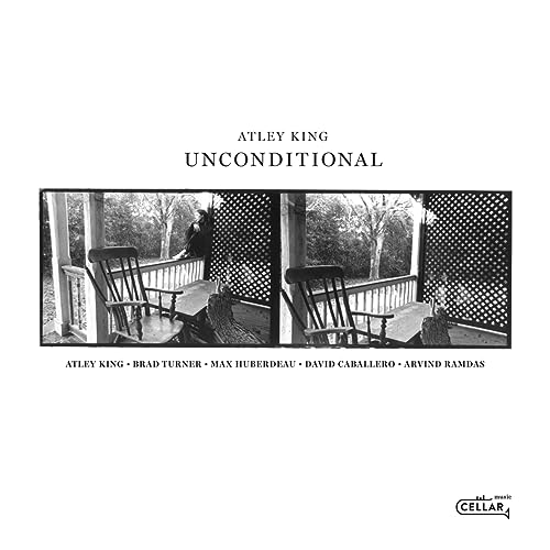 Black and white CD cover with a person sitting on a porch.