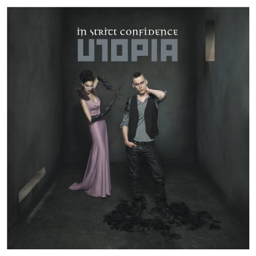 CD cover for In Strict Confidence’s Utopia, featuring two figures in dark setting.
