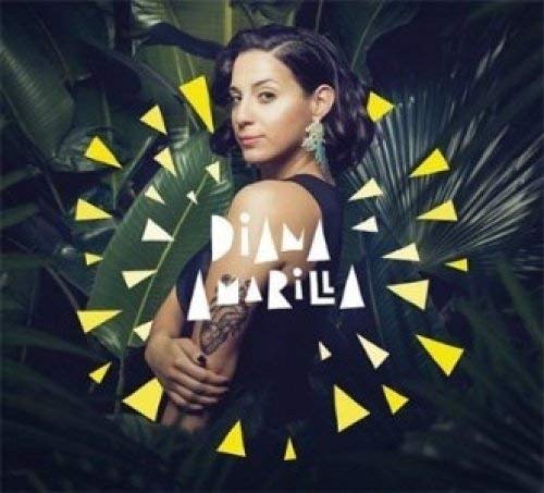 CD cover featuring a woman with dark hair and tropical foliage.