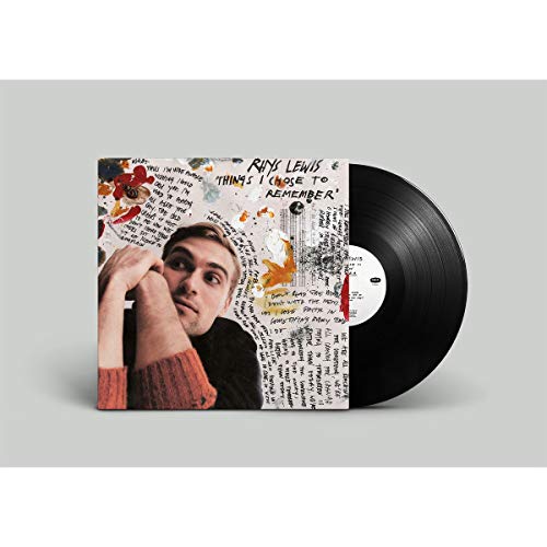 Vinyl record with cover art featuring a man and collaged text and flowers.