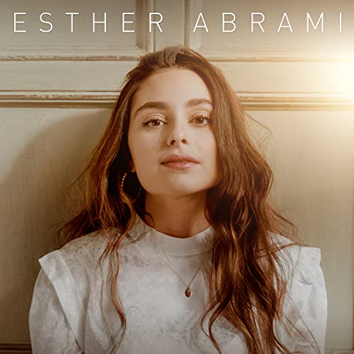 CD cover featuring a portrait of singer Esther Abrami with long brown hair.