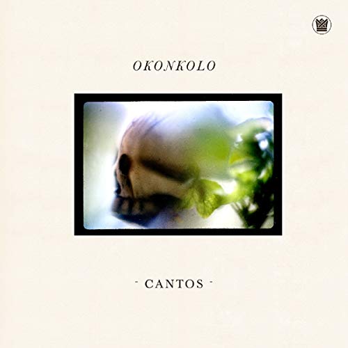 Okonkolo “Cantos” vinyl album cover with skull and foliage image.