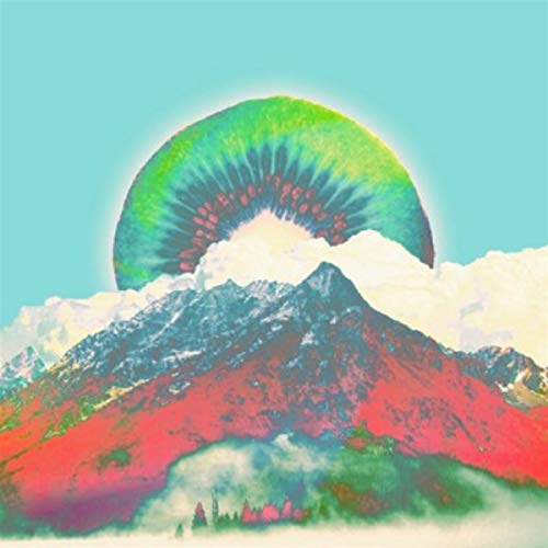 CD cover with a colorful, surreal landscape of mountains and fruit.
