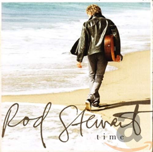 Rod Stewart album cover, man walking on beach with guitar.