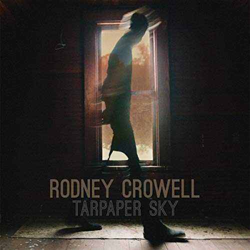 Silhouetted figure standing in a doorway, album cover for Rodney Crowell.