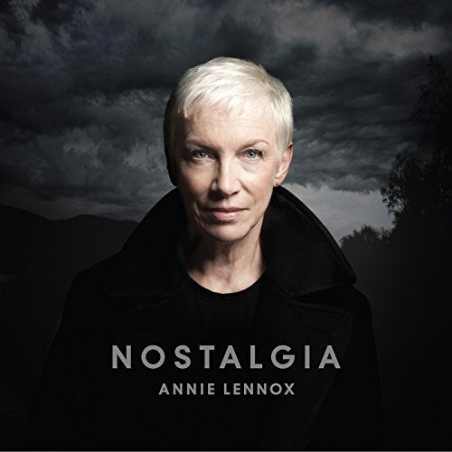 Annie Lennox portrait album cover, āNostalgia,ā with stormy sky background.