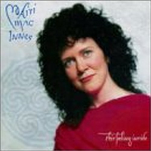 CD cover featuring a portrait of singer Mairi MacInnes with curly hair.