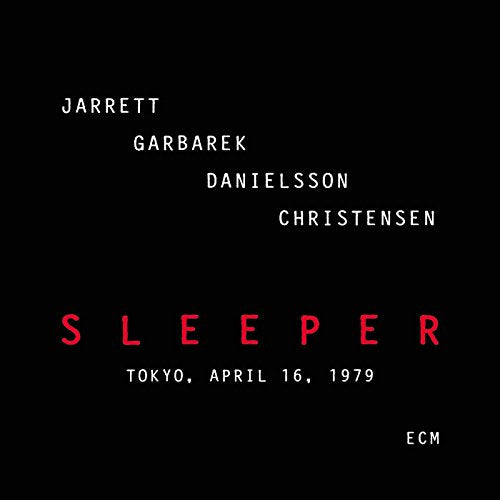 Black album cover with white and red text, featuring artist names and "Sleeper".