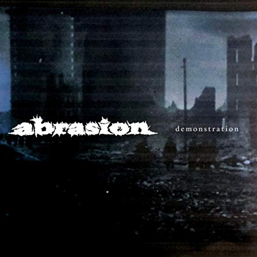 Vinyl record cover: “Abrasion - Demonstration” with a ruined cityscape.