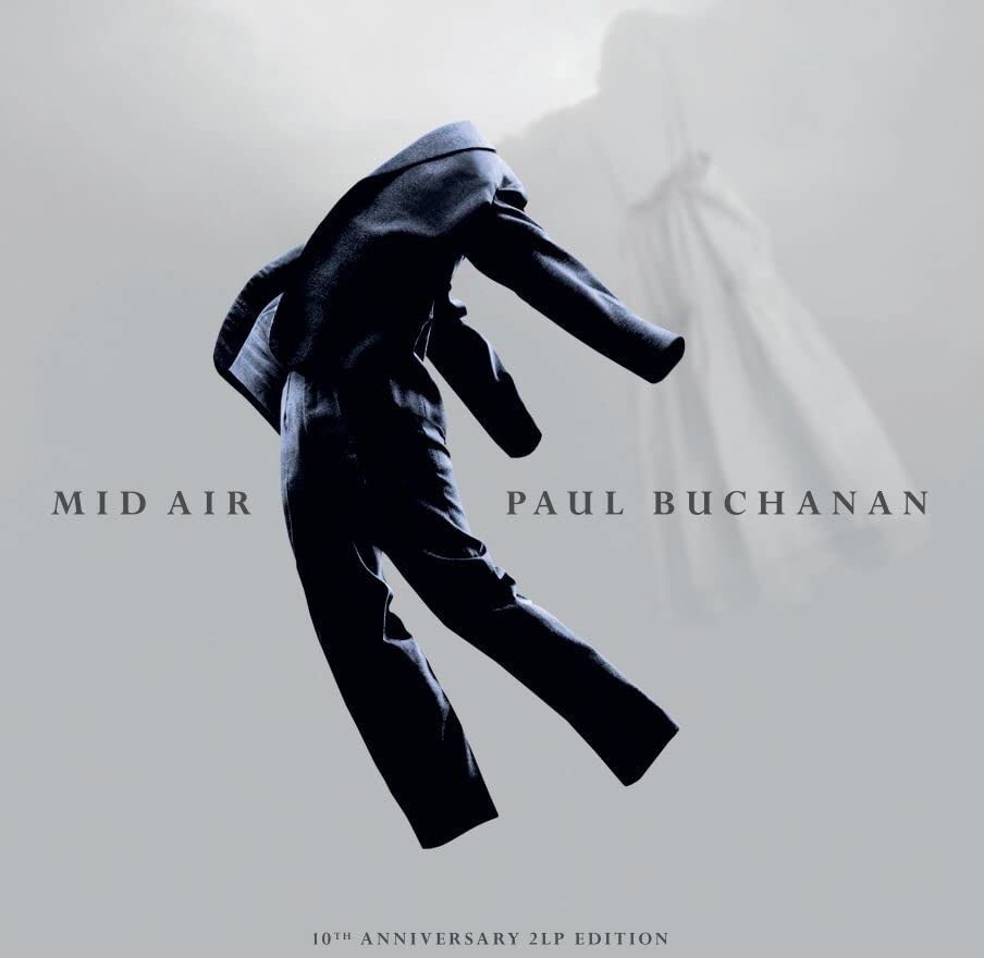 Album cover for Paul Buchanan’s “Mid Air” featuring a falling figure in a suit.