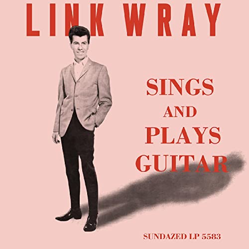 Link Wray album cover: a man in a suit stands on a pink background.