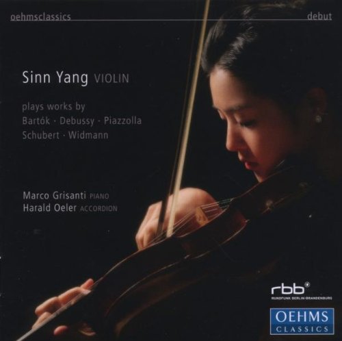 "CD cover featuring a woman playing the violin against a dark background."