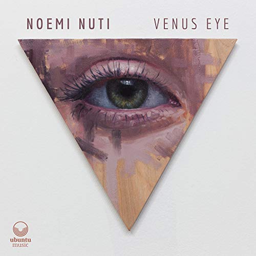 Album cover featuring a triangular image of a painted human eye on a white background.