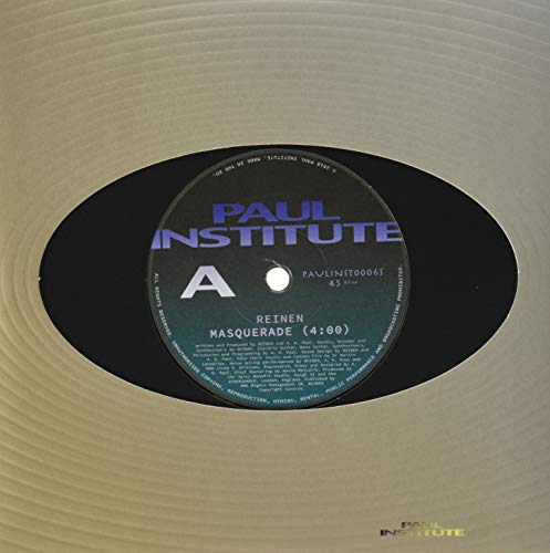 Black vinyl record label with teal text: "Reinen - Masquerade.