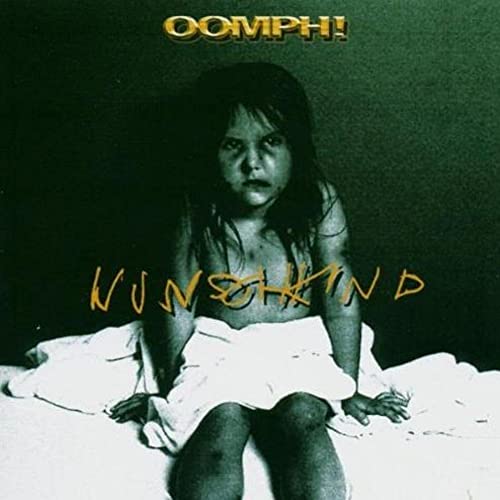 CD cover: dark image of a young person wrapped in white cloth.