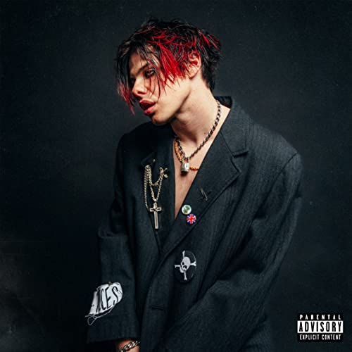 YUNGBLUD album cover featuring a young man in a black suit.