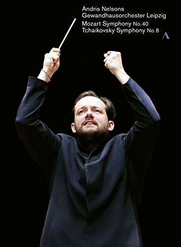 "Mozart/Tchaikovsky DVD cover featuring a conductor with raised arms against a black background."