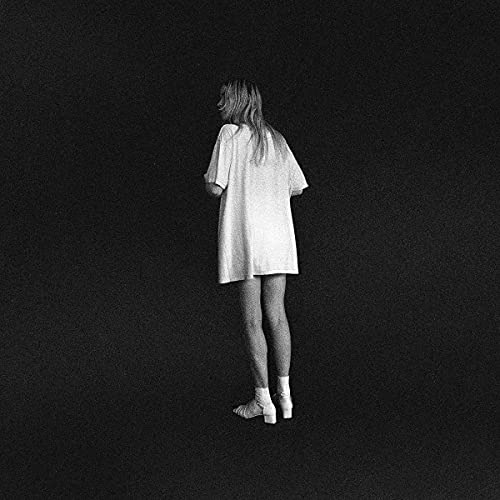 Black and white album cover featuring a person from the back.