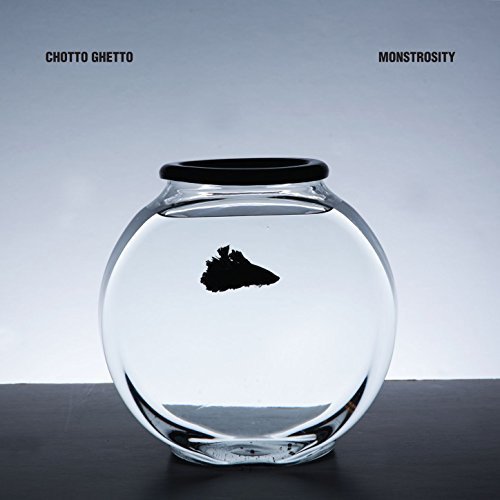 "Album cover featuring a black silhouette of a fish in a glass bowl."