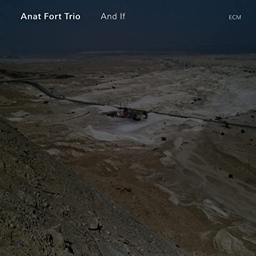 CD cover: aerial view of a desert landscape with winding paths.