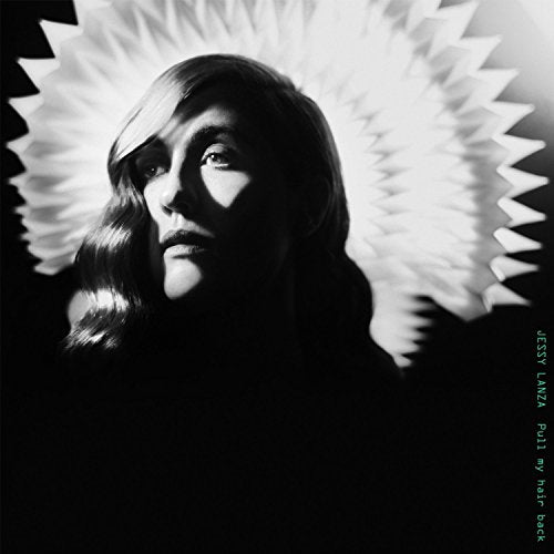 Black and white album cover featuring a woman with a spiky halo.