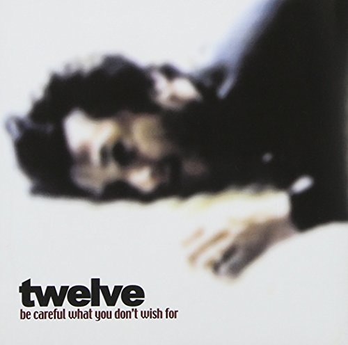 CD cover for "Twelve" featuring a blurry image of a person.