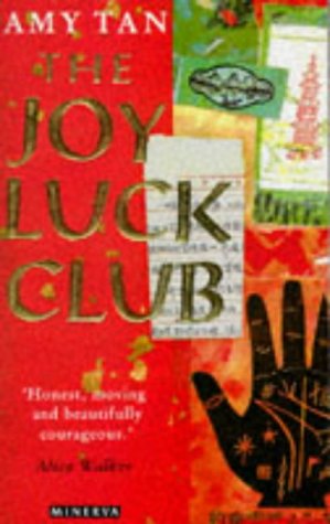 "The Joy Luck Club" book cover featuring a woman in a blue floral dress.