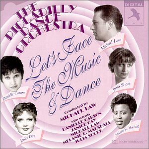 CD cover for “Let’s Face The Music And Dance” featuring portrait photos.