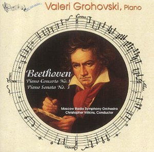 CD cover with Beethoven's portrait surrounded by sheet music on a beige background.