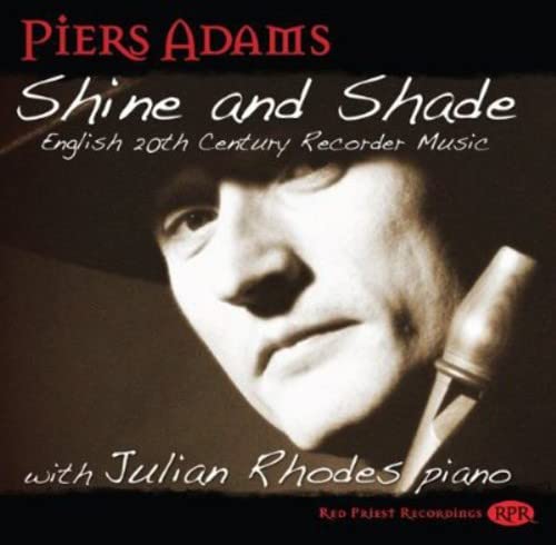 CD cover featuring a portrait of a man with a recorder.
