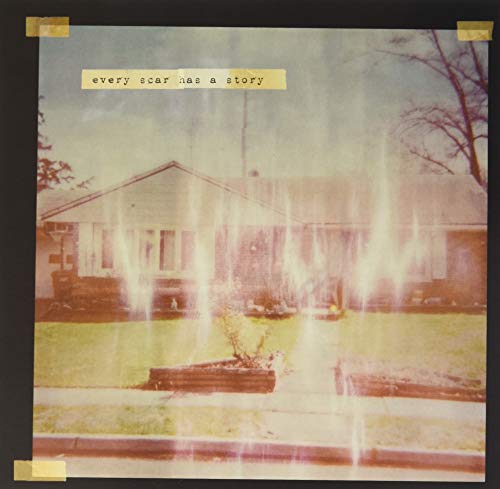 Faded photo of a house with text "every scar has a story".
