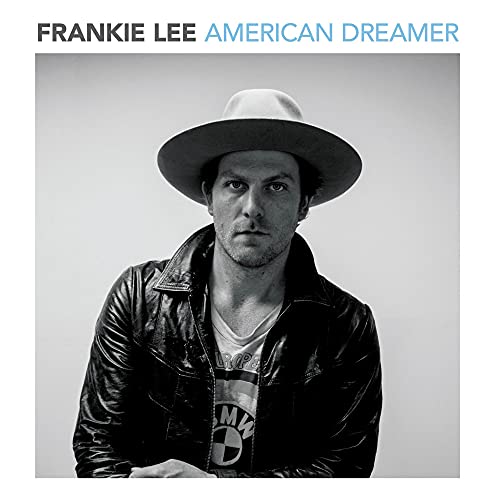 Black and white portrait of Frankie Lee wearing a hat and jacket.