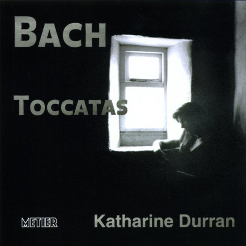 CD cover: "BACH: Toccata" with a woman at a piano in a window.
