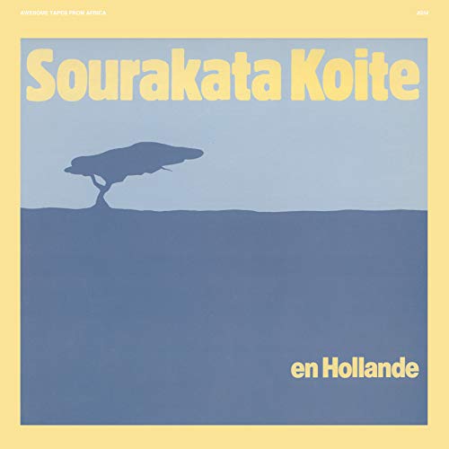Vinyl record cover: tree silhouette over blue and yellow landscape.