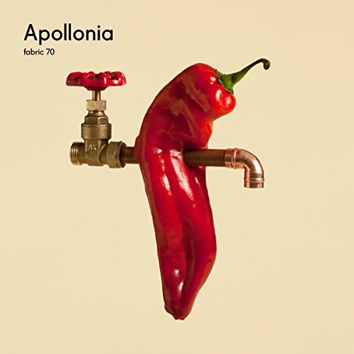 Red chili pepper attached to a copper faucet on a beige background.